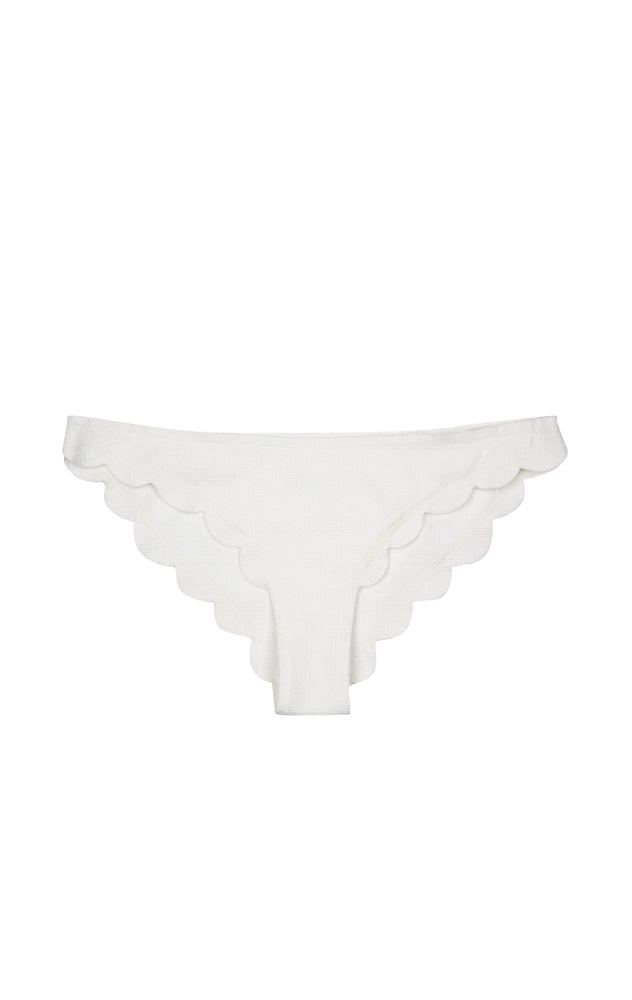 A bikini brief with moderate coverage with scalloped edges